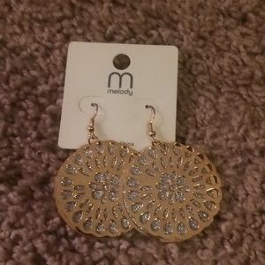 Gold sparking earrings. New with tags.